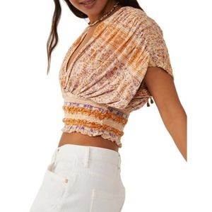 Free People smocked elastic v-neck blouse. NWT’s size medium